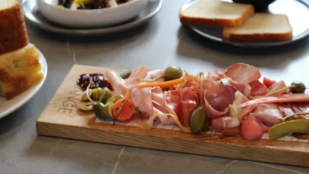 sliced vegetables on wooden chopping board